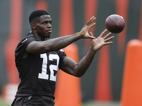Cleveland Browns wide receiver Josh Gordon warms up during the team's organized team activity at its training facility, in Berea, Ohio, on June 5, 2018. (AP Photo/Ron Schwane)
