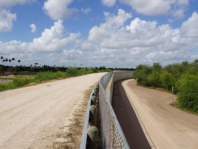 A wall along one of the several layers of the US-Mexico border fencing in the border town of McAllen, Texas on June 14, 2018. (Getty Images)