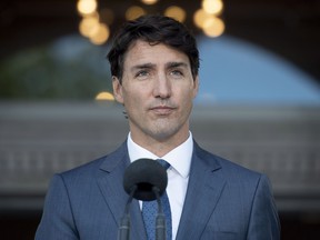 Prime Minister Justin Trudeau speaks during a press conference following a swearing in ceremony at Rideau Hall in Ottawa on Wednesday, July 18, 2018.