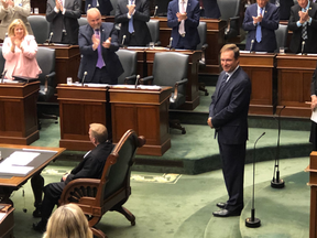 MPP Ted Arnott receives a standing ovation from the House as he takes on the role of the Speaker of the House. on Wednesday, July 11, 2018.