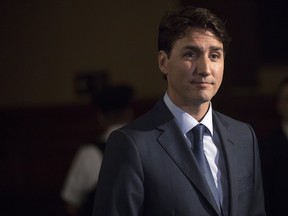 Prime Minister Justin Trudeau faces questions from reporters following his meeting with Ontario Premier Doug Ford at the Ontario Legislature, in Toronto on Thursday, July 5, 2018. THE CANADIAN PRESS/Chris Young