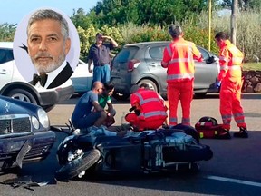 Ambulance personnel tend to a man lying on the ground, later identified as actor George Clooney, after being involved in a scooter accident in the near Olbia, on the Sardinia island, Italy, Tuesday, July 10, 2018. (AP Photo/Mario Chironi)
