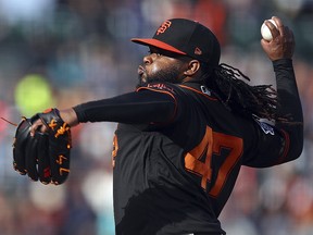 San Francisco Giants pitcher Johnny Cueto works against the Milwaukee Brewers Saturday, July 28, 2018, in San Francisco. (AP Photo/Ben Margot)