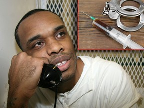 In this June 13, 2018, photo, death-row inmate Christopher Young holds a phone to his ear during an interview outside death row at the Texas Department of Criminal Justice Polunsky Unit near Livingston, Texas. (AP Photo/Mike Graczyk/Getty Images)