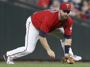 Minnesota Twins second baseman Brian Dozier grabs a line drive Monday, July 30, 2018 in Minneapolis. (AP Photo/Stacy Bengs)