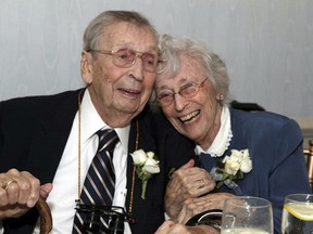 This Sept. 24, 2011 photo provided by Elizabeth Officer shows her grandparents Gilbert Orzell Drake and Evelyn Bennett Drake at the Albany Country Club in Albany, N.Y. (Don Elliot/Elizabeth Officer via AP)