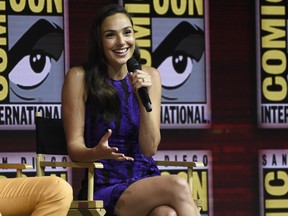 Gal Gadot speaks at the Warner Bros. Theatrical panel for "Wonder Woman 1984" on day three of Comic-Con International on Saturday, July 21, 2018, in San Diego. (Photo by Chris Pizzello/Invision/AP)