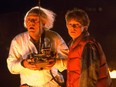 Christopher Lloyd as Dr. Emmett Brown, Michael J. Fox as Marty McFly in 1985's Back to the Future.