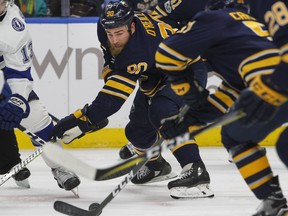 In this Nov. 28, 2017, file photo, Buffalo Sabres forward Ryan O'Reilly (90) wins the draw during the second period of an NHL hockey game against the Tampa Bay Lightning in Buffalo, N.Y. (AP Photo/Jeffrey T. Barnes, File)