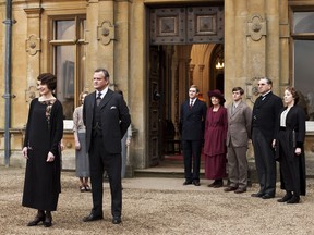 This undated publicity photo provided by PBS shows, from left, Elizabeth McGovern as Lady Grantham, Hugh Bonneville as Lord Grantham, Dan Stevens as Matthew Crawley, Penelope Wilton as Isobel Crawley, Allen Leech as Tom Branson, Jim Carter as Mr. Carson, and Phyllis Logan as Mrs. Hughes, from the TV series, "Downton Abbey." (AP Photo/PBS, Carnival Film & Television Limited 2012 for MASTERPIECE, Nick Briggs)