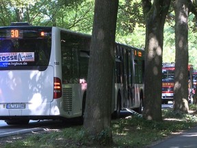 A bus stands on a street in Luebeck, northern Germany, Friday, July 20, 2018 after a man attacked people inside.