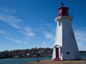 In this March 3, 2017, the Mulholland Point Light in Campobello Island, New Brunswick, stands with Lubec, Maine across the water. Lubec is the easternmost town in the contiguous United States with a border crossing to Canada. (DON EMMERT/AFP/Getty Images)