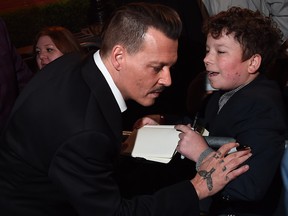 Johnny Depp meets fans as he attends  the 'Murder On The Orient Express' World Premiere held at Royal Albert Hall on November 2, 2017 in London.  (Eamonn M. McCormack/Eamonn M. McCormack/Getty Images/for 21st Century Fox)