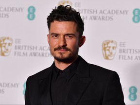 British actor Orlando Bloom is seen in the press room after presenting an award at the BAFTA British Academy Film Awards at the Royal Albert Hall in London on February 18, 2018. (Ben Stansall/Getty Images)