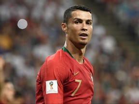 Portugal's forward Cristiano Ronaldo reacts during the Russia 2018 World Cup Group B football match between Iran and Portugal at the Mordovia Arena in Saransk on June 25, 2018. (Filippo Monteforte/Getty Images)