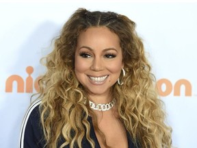 FILE - In this March 11, 2017 file photo, Mariah Carey arrives at the Kids' Choice Awards in Los Angeles.