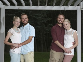 From left, Krissie Bevier and fianc, Zack Lewan and Nicholas Lewan and fianc, Kassie Bevier, pose for a photo, Sunday, July 29, 2018, in Grass Lake. (Nikos Frazier /Jackson Citizen Patriot via AP)