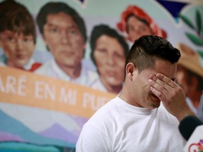 In this June 25, 2018 file photo, Christian, from Honduras, recounts his separation from his child at the border during a news conference at the Annunciation House, in El Paso, Texas.