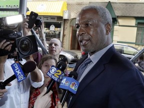 In this April 11, 2017, file photo, former New York Knicks star Charles Oakley talks to the press after an appearance in Manhattan Criminal Court, in New York.