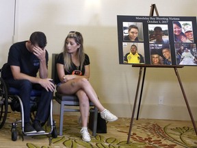 Fiorella Gaeta consoles her fiance Jason McMillan, a Riverside County Sheriff's deputy who was shot and paralyzed in the Oct, 1, 2017, Las Vegas shooting.