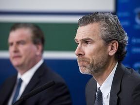 Vancouver Canucks general manager Jim Benning (left) and Trevor Linden, president of hockey operations, hold a media presser in Vancouver, B.C. on Monday, April 10, 2017. (THE CANADIAN PRESS/Jimmy Jeong)