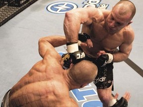 Matt Serra connects with a shot during a UFC title victory over Georges St. Pierre in 2008.