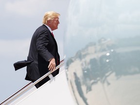 President Donald Trump boards Air Force One, Thursday, July 5, 2018, at Andrews Air Force Base, Md., en route to a rally in Great Falls, Mont.
