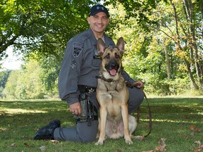 Midas with his handler, Deputy Patrick Hoder. (Facebook photo)