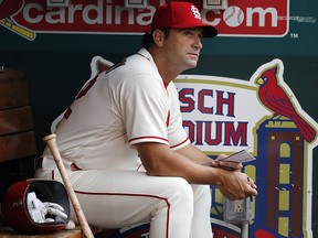 St. Louis Cardinals manager Mike Matheny sits in the dugout Saturday, July 14, 2018, in St. Louis. (AP Photo/Jeff Roberson)