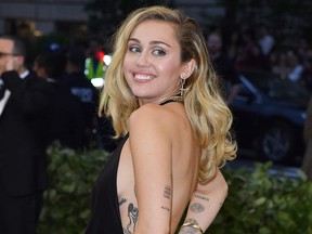 In this file photo taken on May 7, 2018 Miley Cyrus arrives for the 2018 Met Gala on May 7, 2018, at the Metropolitan Museum of Art in New York. (Getty Images)