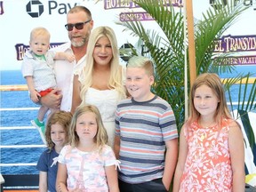 Tori Spelling and family attend the  'Hotel Transylvania 3: Summer Vacation'  premiere at the Regency Village Theatre in Los Angeles, California on June 30, 2018. (Sheri Determan/WENN.com)