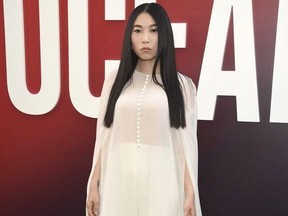 Internet-famed rapper and actress Awkwafina is set to host the iHeartRadio MMVAs. Awkwafina attends the world premiere of "Ocean's 8" at Alice Tully Hall on Tuesday, June 5, 2018, in New York.