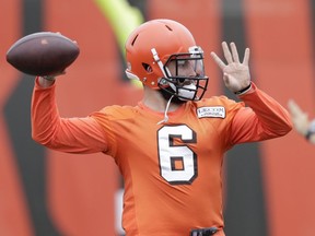 Cleveland Browns quarterback Baker Mayfield throws during practice at the team's training camp facility in Berea, Ohio on June 12, 2018. (AP Photo/Tony Dejak)