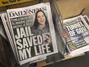 Copies of the  New York Daily News are for sale at a news stand in New York, Monday, July 23, 2018, after the paper told employees that the newspaper is reducing its editorial staff by 50%.