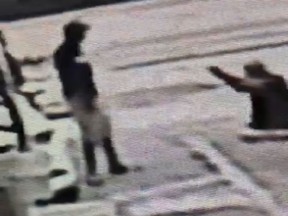 Surveillance video provided by the owner of a Circle A Food Store shows Michael Drejka, right, pull a gun towards Markeis McGlockton after McGlockton pushed Drejka to the ground. The deadly dispute started after Drejka confronted McGlockton's girlfriend for parking in a handicapped spot.