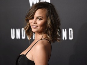 In this Feb. 28, 2017, file photo, model Chrissy Teigen poses at the season two premiere of the television series "Underground" in Los Angeles.