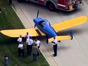 A screengrab from video of the plane on Lake Shore Drive in Chicago.