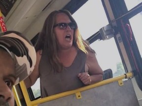 An unnamed  New York woman is scene in a racially-charged rant on a bus. (Facebook/Zoe Mac)