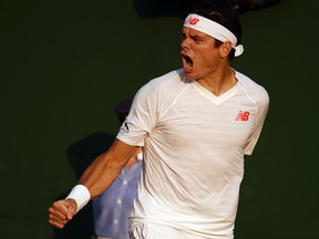 Milos Raonic celebrates a point against Dennis Novak during Wimbledon in London, on July 6, 2018. (Getty Images)
