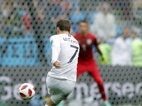 France's Antoine Griezmann scores his side's second goal during the quarterfinal match between Uruguay and France at the 2018 soccer World Cup in the Nizhny Novgorod Stadium, in Nizhny Novgorod, Russia, Friday, July 6, 2018. (AP Photo/Ricardo Mazalan)