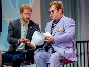 Sir Elton John and Prince Harry, the Duke of Sussex during the second day of the AIDS 2018 Conference in Amsterdam on July 24, 2018. (Dutch Press Photo/WENN.com)