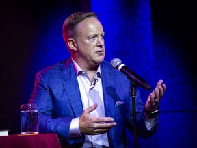 Former White House Press Secretary Sean Spicer speaks about his new book "The Briefing: Politics, The Press, and The President," at a book launch party in Washington, D.C., on July 24, 2018.