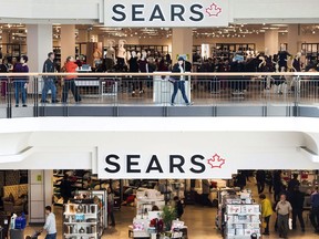 Retirees of bankrupt Sears Canada Inc. filed a motion in court to award them the remainder of the former department store chain's cash over other creditors to help fund their pension shortfall. Shoppers enter and leave a Sears retail store in Toronto on Thursday, October 19, 2017.
