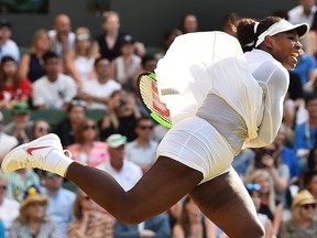 U.S. player Serena Williams serves to France's Kristina Mladenovic in their women's singles third round match on the fifth day of the 2018 Wimbledon Championships at The All England Lawn Tennis Club in Wimbledon, southwest London, on July 6, 2018.