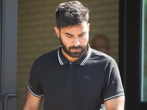 Truck driver Jaskirat Sidhu walks out of Saskatchewan provincial court after appearing for charges due to the Humboldt Broncos bus crash in Melfort, Sask., on Tuesday, July 10, 2018.