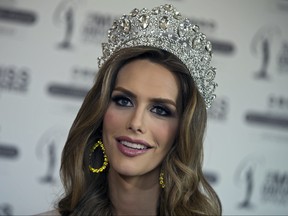 Angela Ponce, who won Spain's Miss Universe competition in June, speaks during an interview with The Associated Press in Madrid, Spain on Tuesday, July 10, 2018. (AP Photo/Paul White)