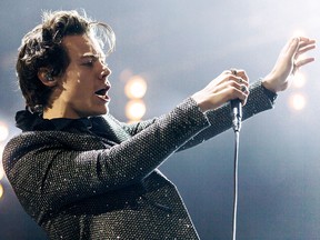 In this handout photo provided by Helene Marie Pambrun, Harry Styles performs during his European tour at AccorHotels Arena on March 13, 2018 in Paris, France.