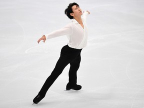 In this file photo taken on Oct. 20, 2017, Kazakhstan's Denis Ten performs his routine in the men's short program at the Rostelecom Cup 2017 ISU Grand Prix of Figure Skating in Moscow.