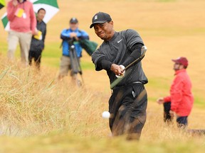 Tiger Woods hits his second shot from the rough on the second hole during the second round of the British Open at Carnoustie Golf Club on July 20, 2018 in Carnoustie, Scotland. (Harry How/Getty Images)