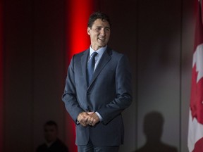 Prime Minister Justin Trudeau delivers remarks at a Liberal Party fundraising event in Brampton, Ontario on Thursday July 5, 2018. (The Canadian Press/Chris Young)